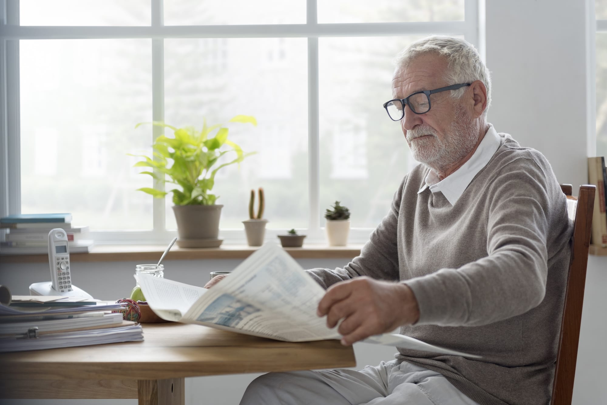 SEnior Adult Readding Newspaper Leisure Concept | Clarity Hearing